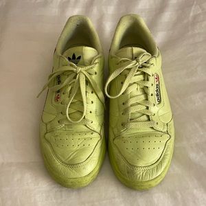 Neon yellow Adidas continentals